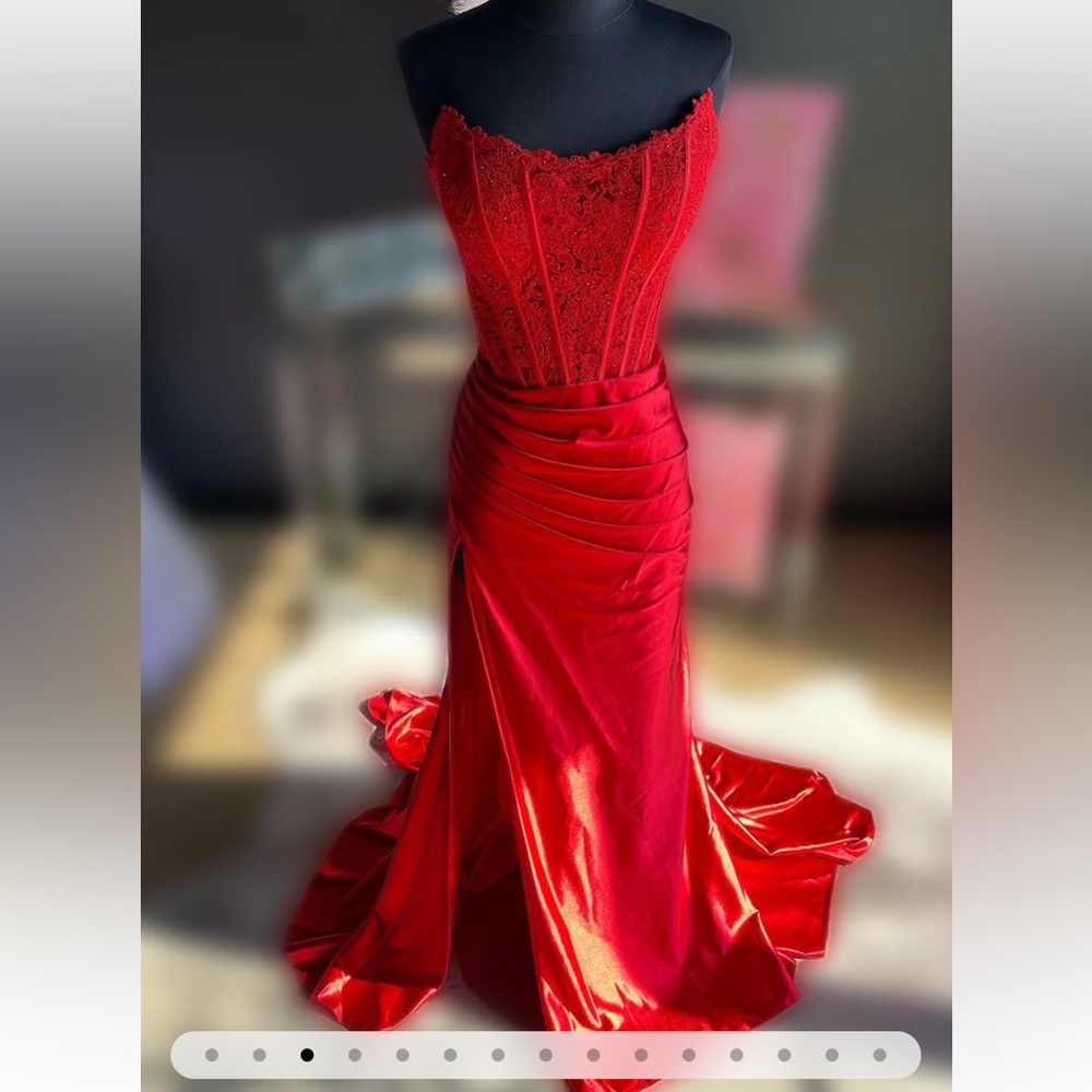 Red strapless satin corset lace up dress with a slit